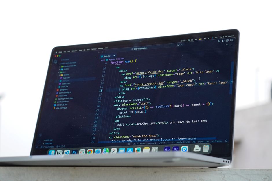 Developer coding Infrastructure as Code with Terraform on a laptop