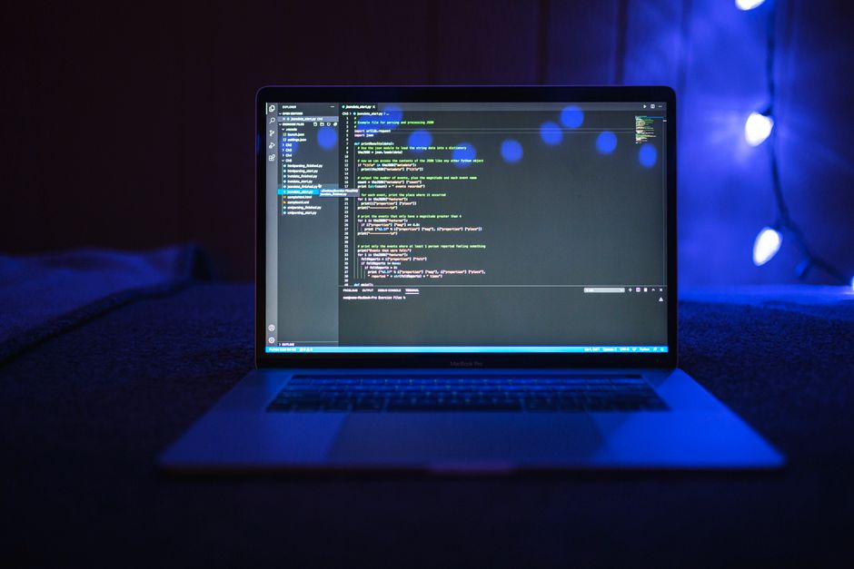 AWS Developer Associate DVA-C02 study guide with cloud coding on laptop